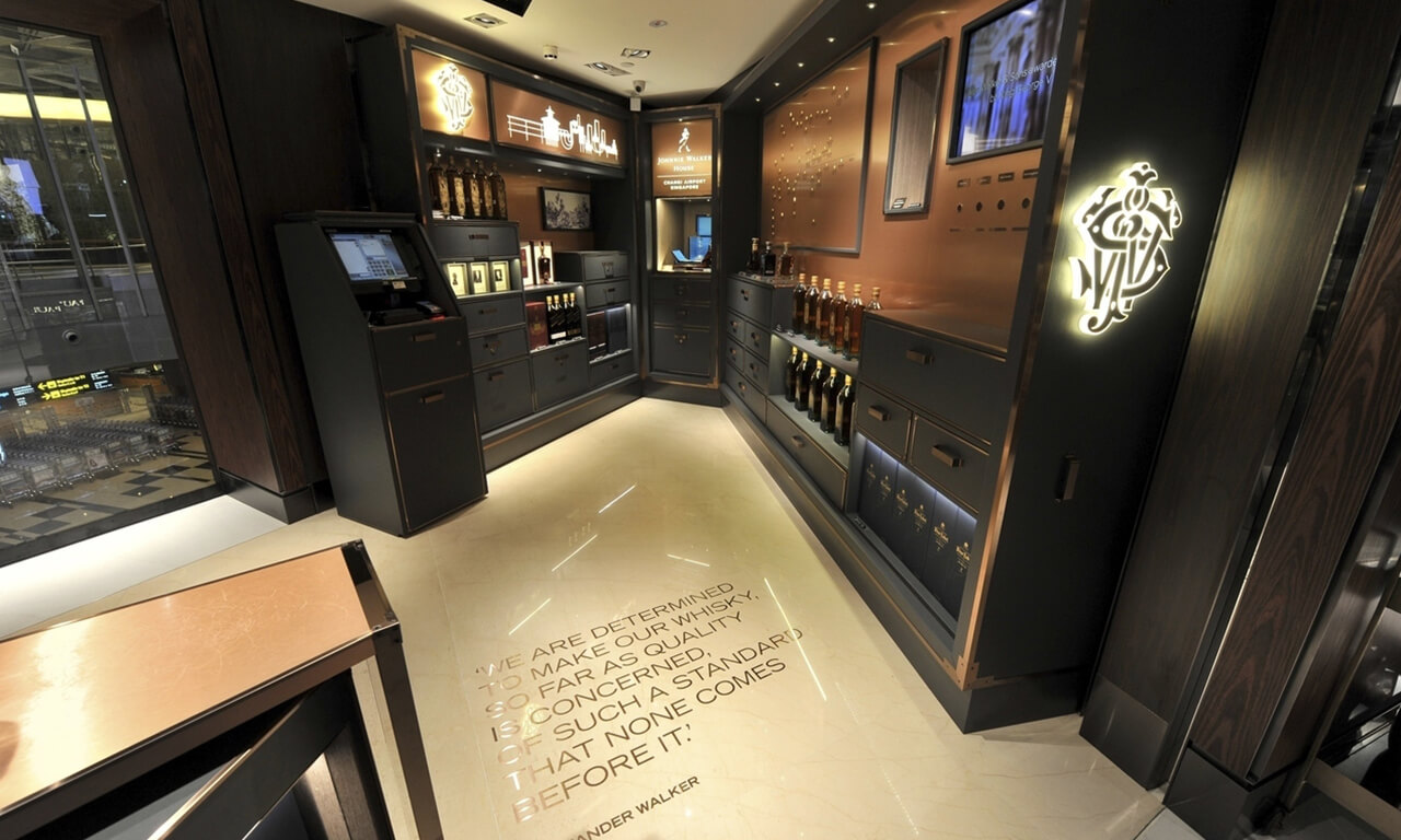 changi airport johnniewalker scentmarketing retail equalstrategy Full view of Johnnie Walker House at Changi Airport featuring scent marketing integration